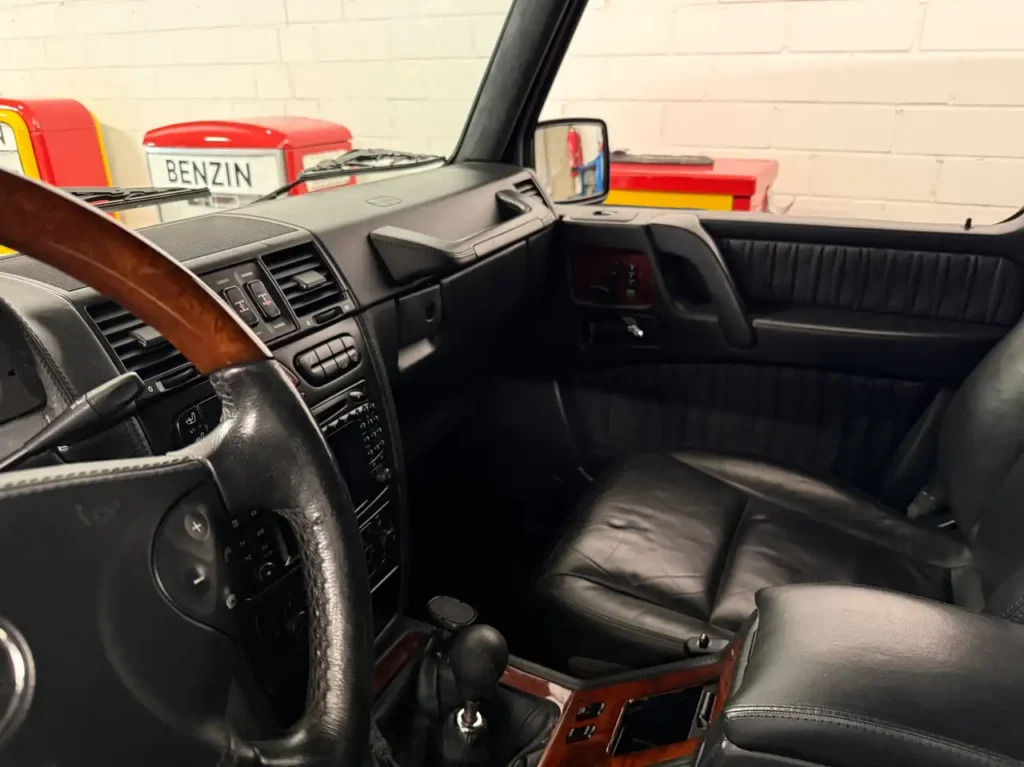 Mercedes Benz G55 AMG schwarz Foto vom Beifahrersitz.